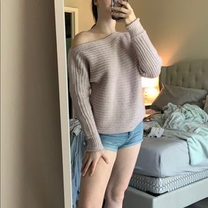 A purple soft sweater